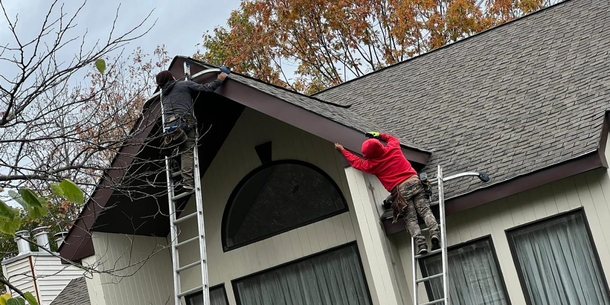 seamless gutters installation on a residential home